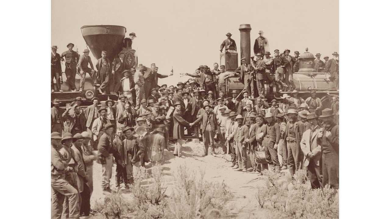 1869年、大陸横断鉄道の開通式(ユタ州プロモントリー)(パブリックドメイン)